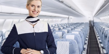 Finnair economy cabin attendant