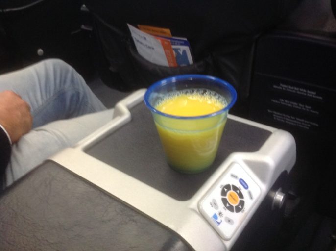 United Airlines Business Class, jus d'orange voor het opstijgen