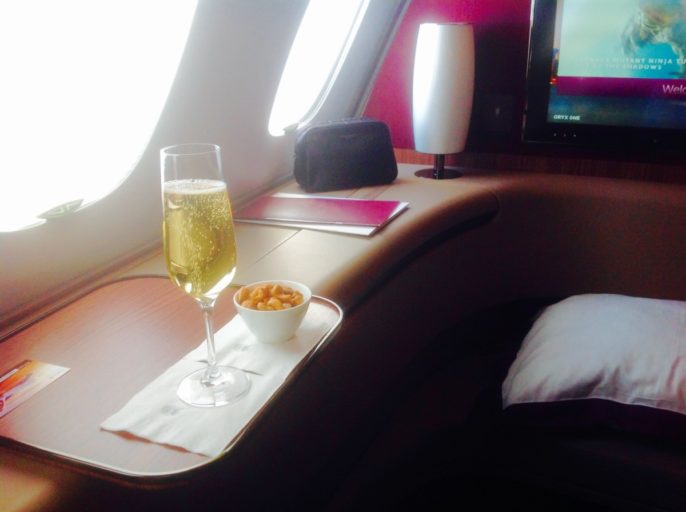 qatar airways, first class, a380, champagne