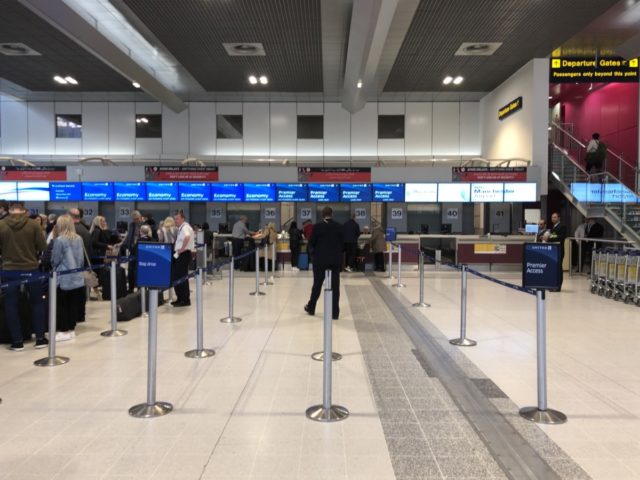 united airlines, check-in, manchester