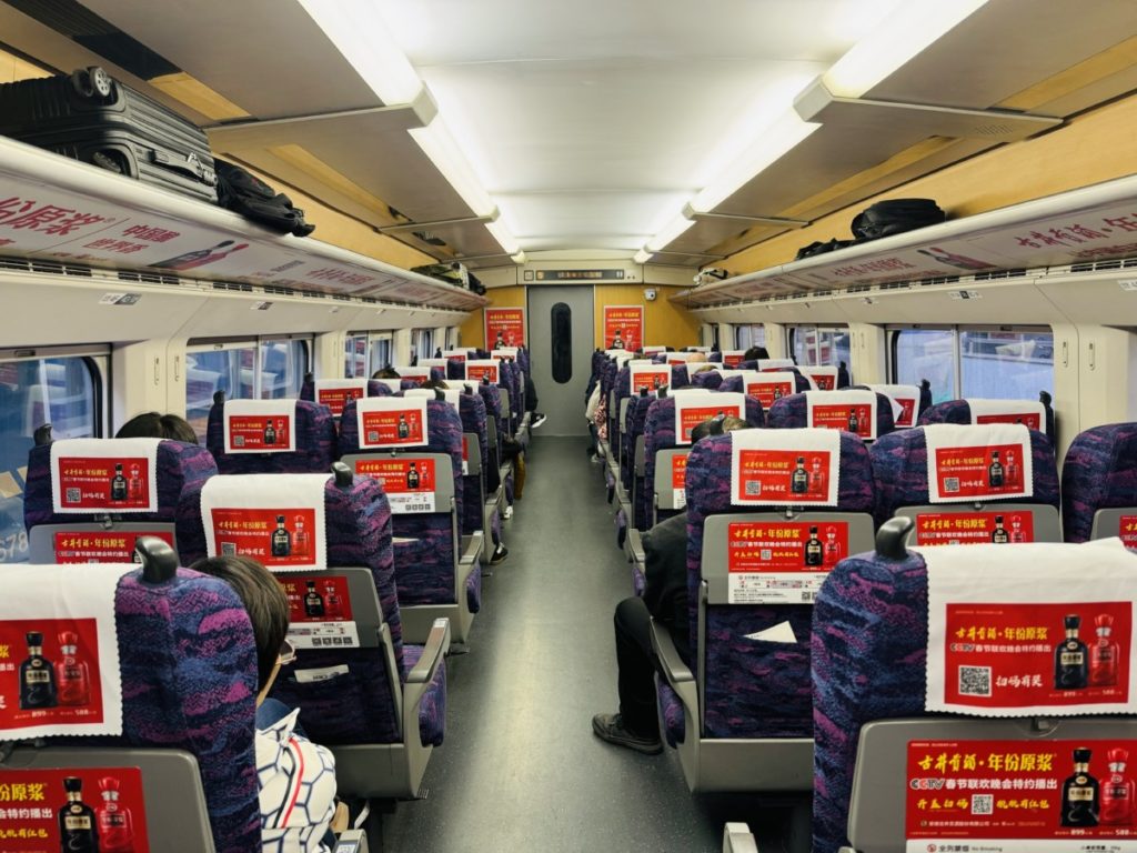 De stoelen in de 2e klasse in de G7268 Trein van Nanjing naar Shanghai.